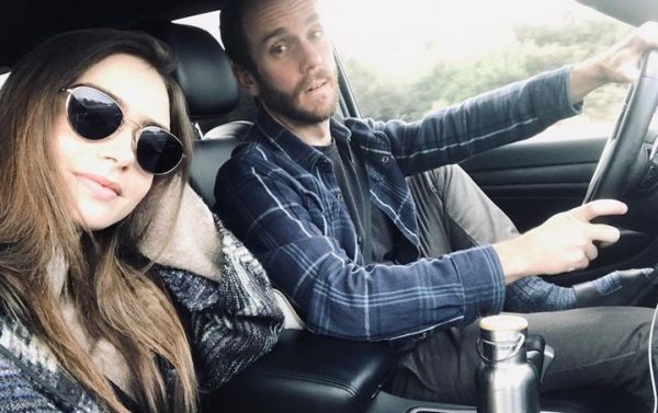 Charlie McDowell and his wife in the car