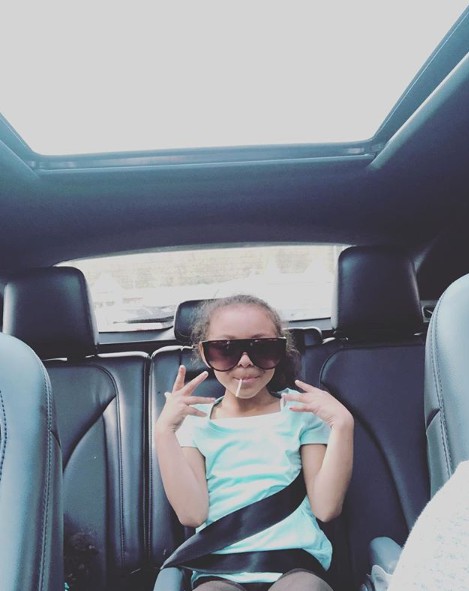Avielle Janelle Hernandez poses for a photo in the car