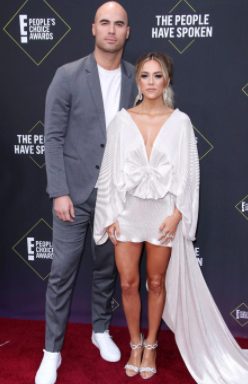 Mike Caussin poses with his lovely wife Jana Kramer