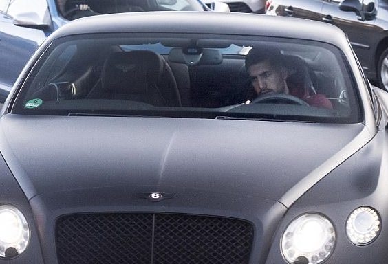 Maria Cataleya's boyfriend Emre Can poses in his car