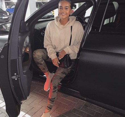 Chloe Welleans-Watts pictured with her car