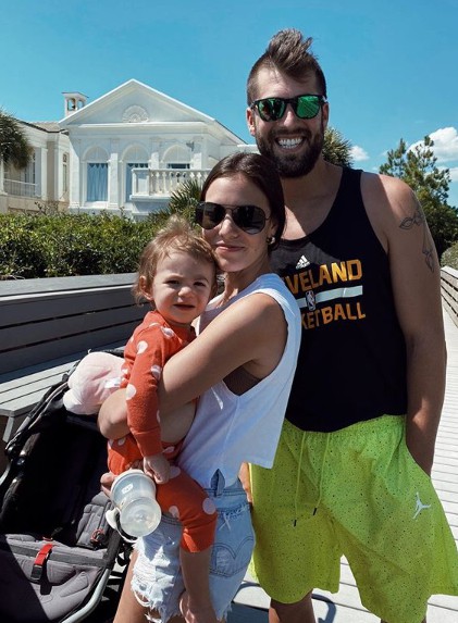 Taylor Monaco with her husband Michael and daughter