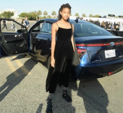 Willow Smith poses with her car
