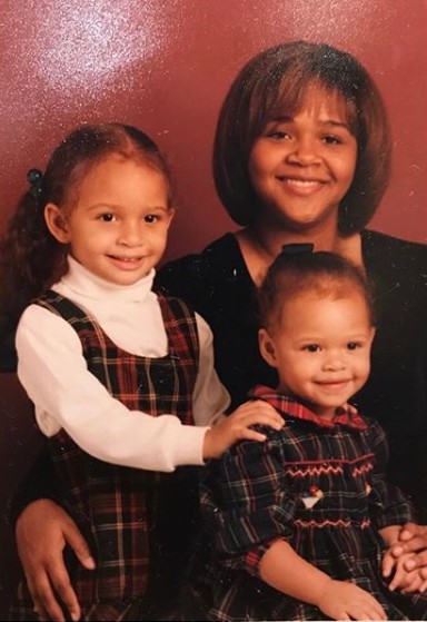 Childhood photo of Alexis Jordan with mother and sister
