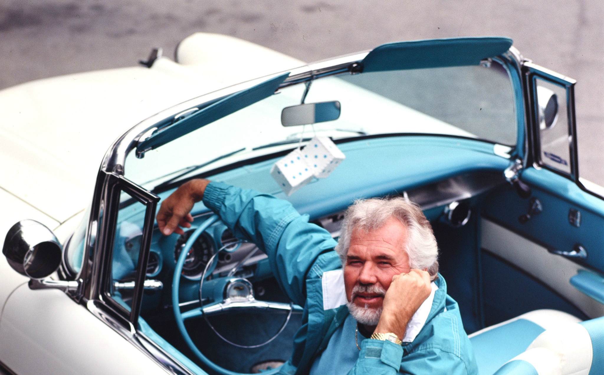     Kenny Rogers and his 1957 convertible Cadillac on January 15, 1990 in Beverly Hills, Los Angeles, California