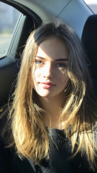 Christina Pimenova posing in the car