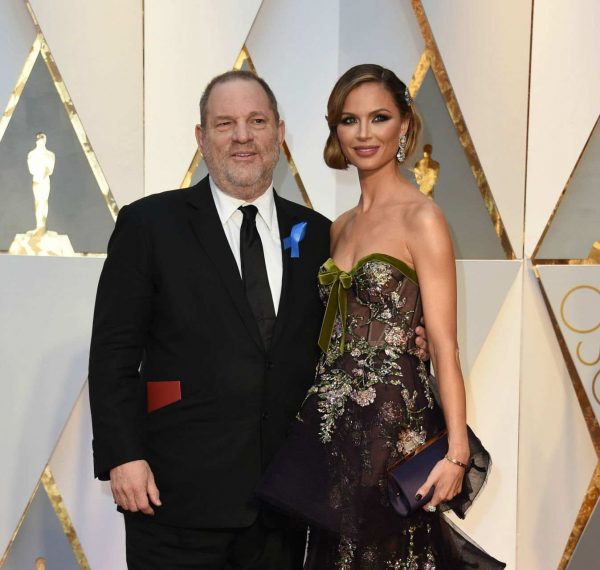 American producer Harvey Weinstein, left, and his wife American designer Georgina Chapman arrive on the red carpet for the 89th Academy Awards in Hollywood, California on February 26, 2017