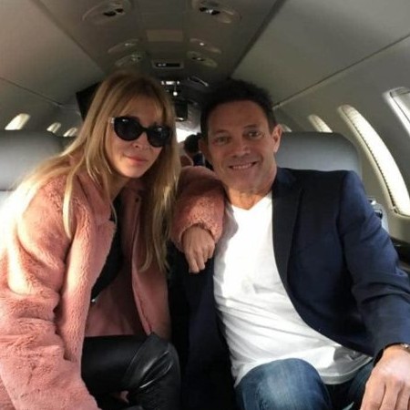 Chandler Belfort pictured with her father Jordan Belfort on the plane
