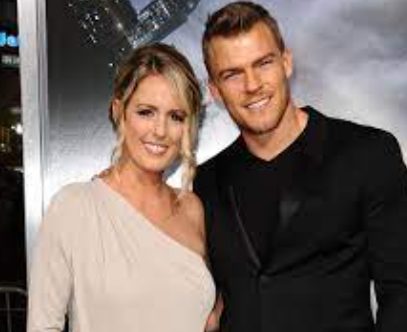 Alan Ritchson clicks for a photo with wife Katherine Ritchson