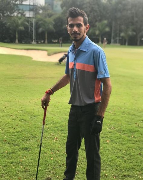 Uzvindra Chahal playing golf