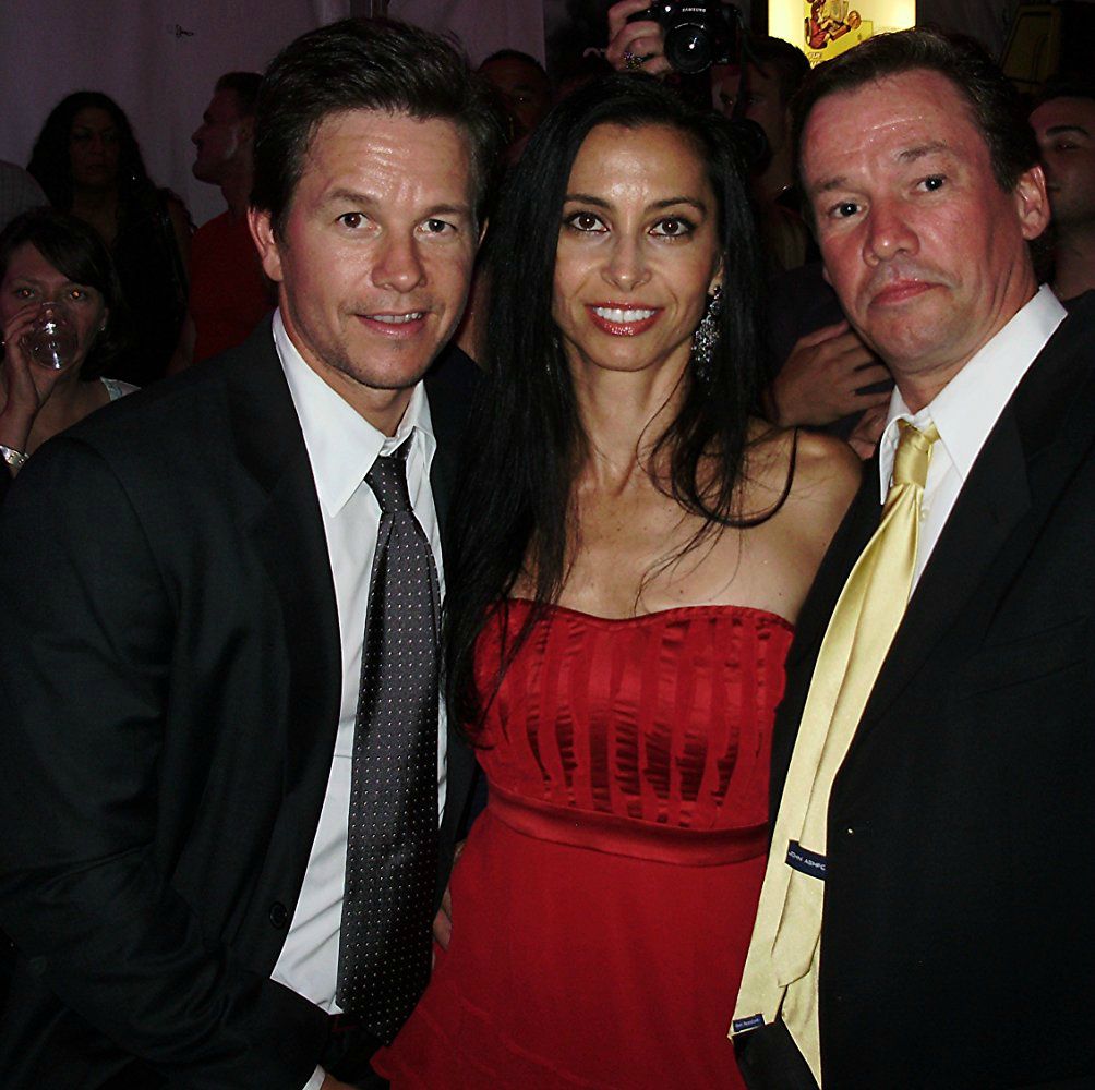 Arthur Wahlberg with his girlfriend and his brother Mark
