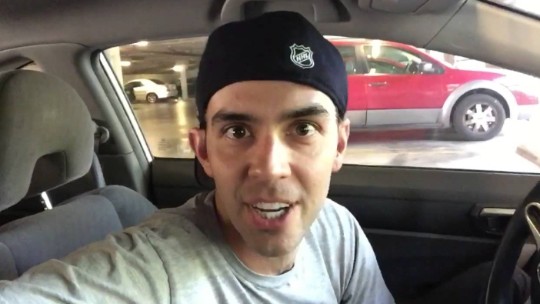 Peter Stickles' husband Michael Carbonaro poses in the car
