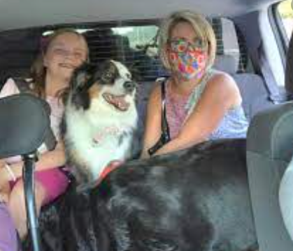 Kelly L. Frey in the car with family 