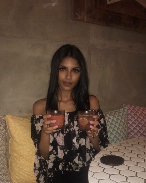 Veneraman enjoying a cocktail at a party