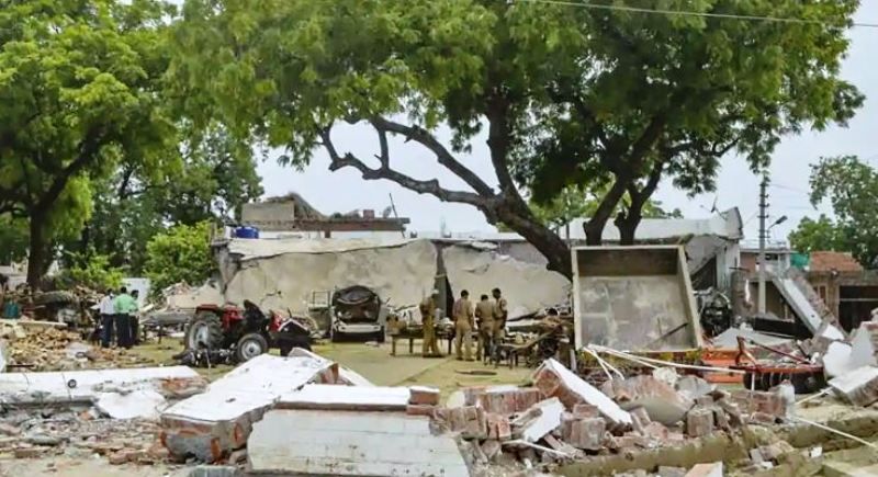 Debris lies on the ground after the house of Kanpur gangster Vikas Dubey was demolished