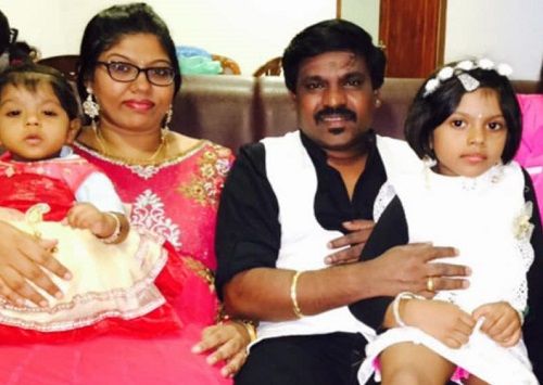 Velmurugan with his wife and daughter