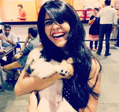 Veena Jagtap with dog