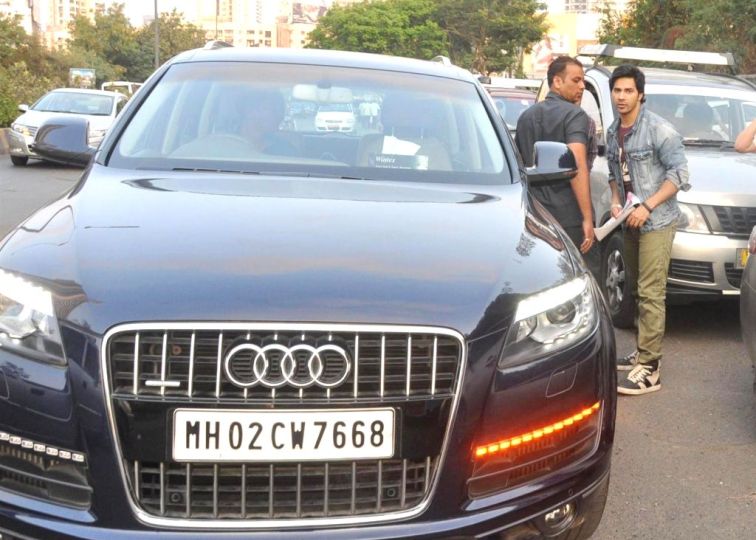 Varun Dhawan and his Audi Q7