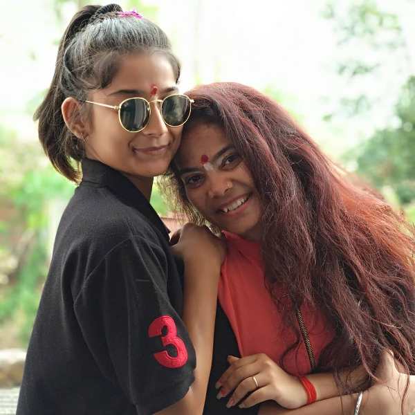 Vartika Jha and her sister
