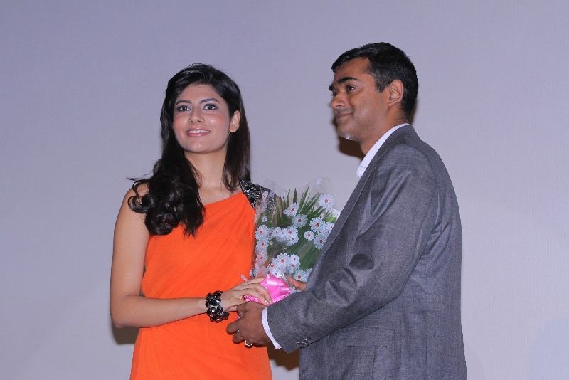 Vanya Mishra is welcomed with flowers at the event