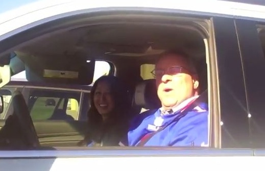 Kelly Pegula's parents pose in the car