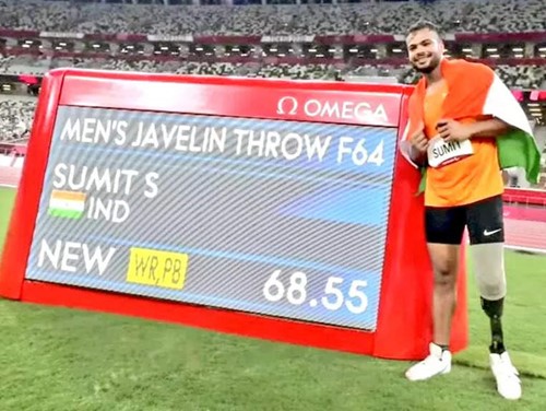 Sumit Antil with the scoreboard after setting a world record at the 2020 Summer Paralympics