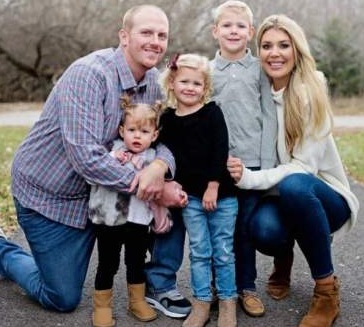 Kristen Nordland with her husband Brie Reed and children