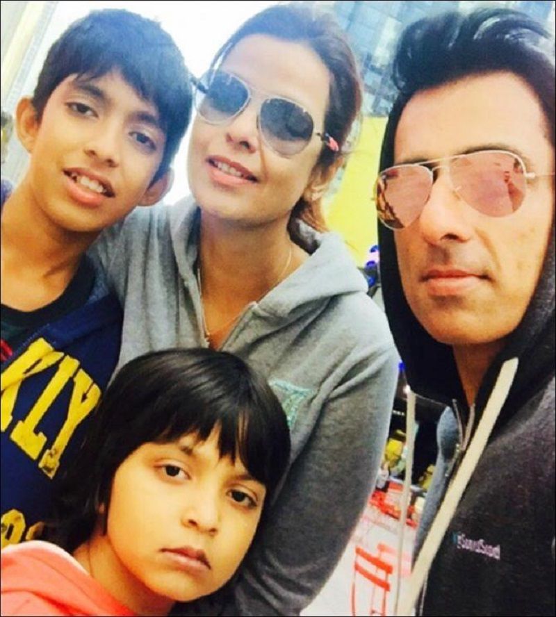 Sonali Sood with her husband and children