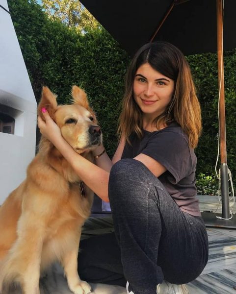Isabella Rose Giannulli playing with her dog