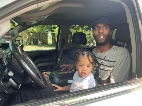 Tyrus Thomas in the car with his son