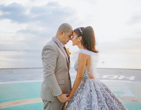 Perry Choi and his wife Kris Bernal at their wedding
