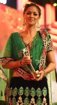 Simran wins award of excellence