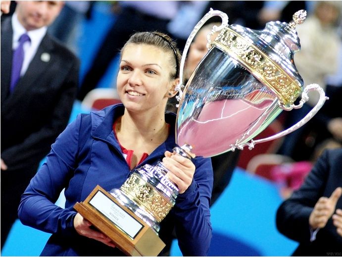 Simona Halep and her 2013 WTA Championship trophy