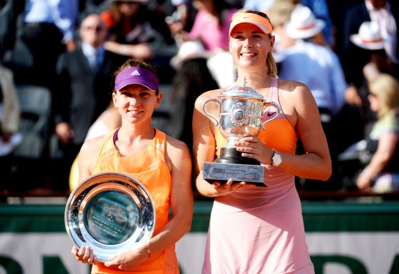 Simone Halep and Maria Sharapova at the 2014 French Open
