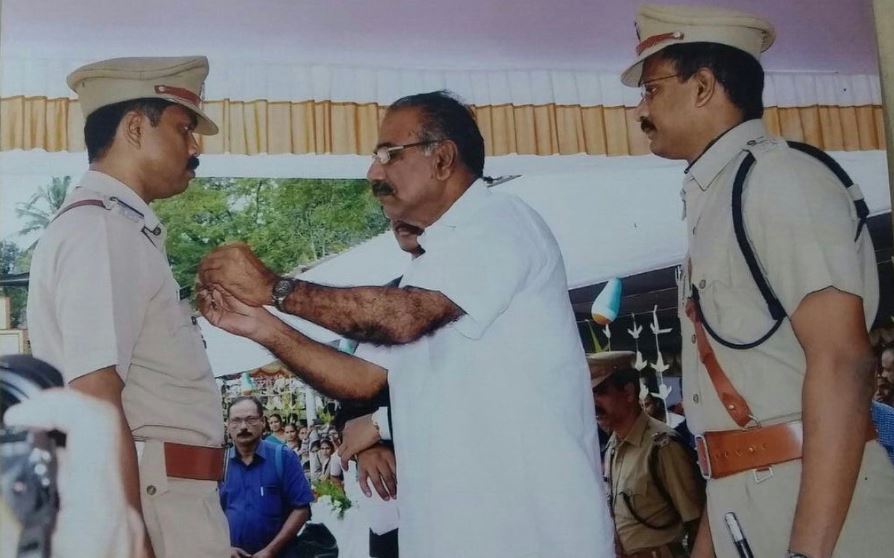 Sibi Thomas when receiving the Chief Minister's Police Medal in 2015