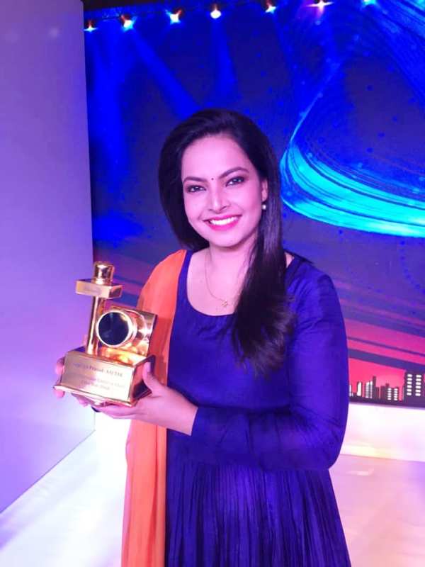 Shweta Jha with her awards