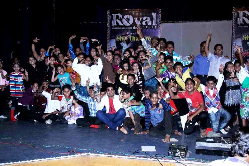 Shiv Thakare and his dance studio students