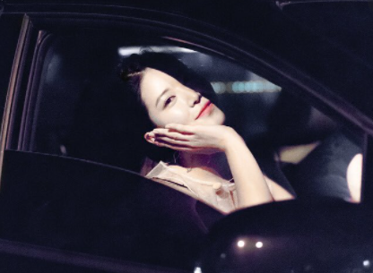Ha Yun sits in the car 