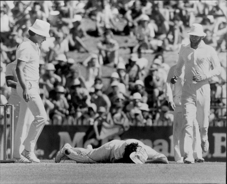 Sandeep lies on the ground behind Len Pascoe's bodyguard during the Sydney game against Australia on January 2, 1981