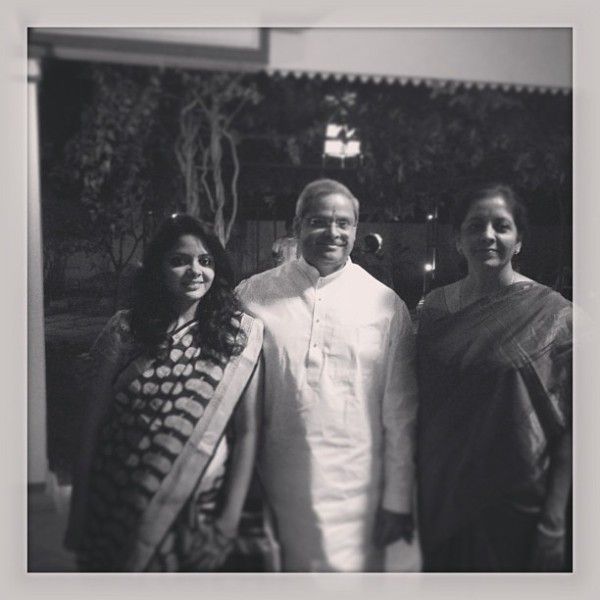 Prakala Prabhakar with his wife and daughter