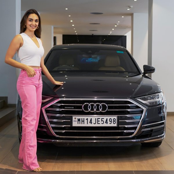 Kiara Advani poses with her brand new car, the Audi A8 L