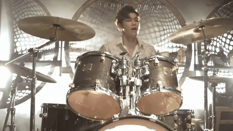 Ong Seong Wu playing drums