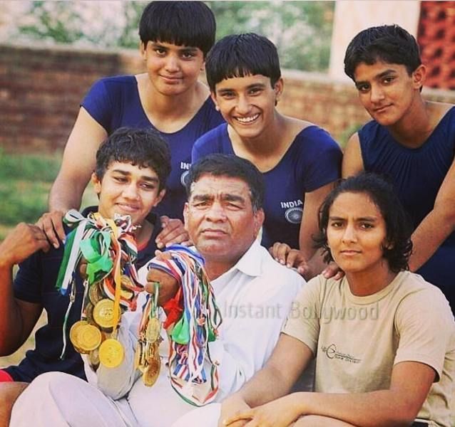 The Phogat sisters and their father