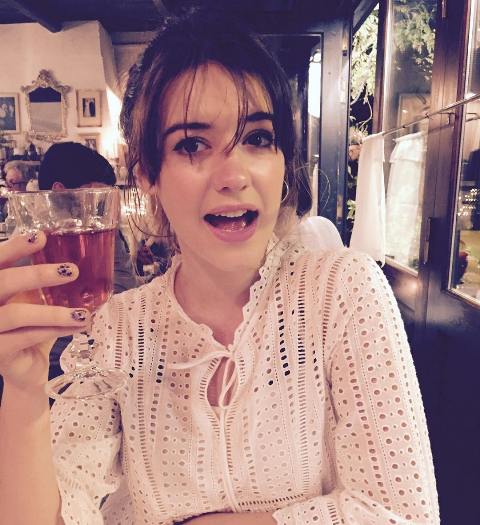 Daisy Edgar-Jones drinking