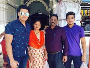 Anuj Rawat and his family