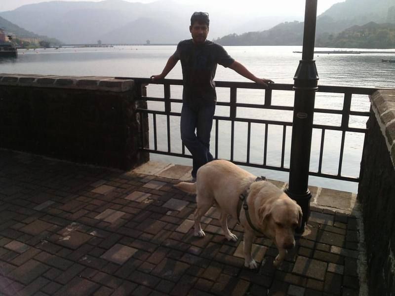 Aditya and a dog
