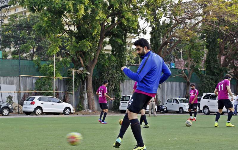 Abishek Bachchan plays football