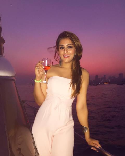 Aarti Chabria with a glass of wine