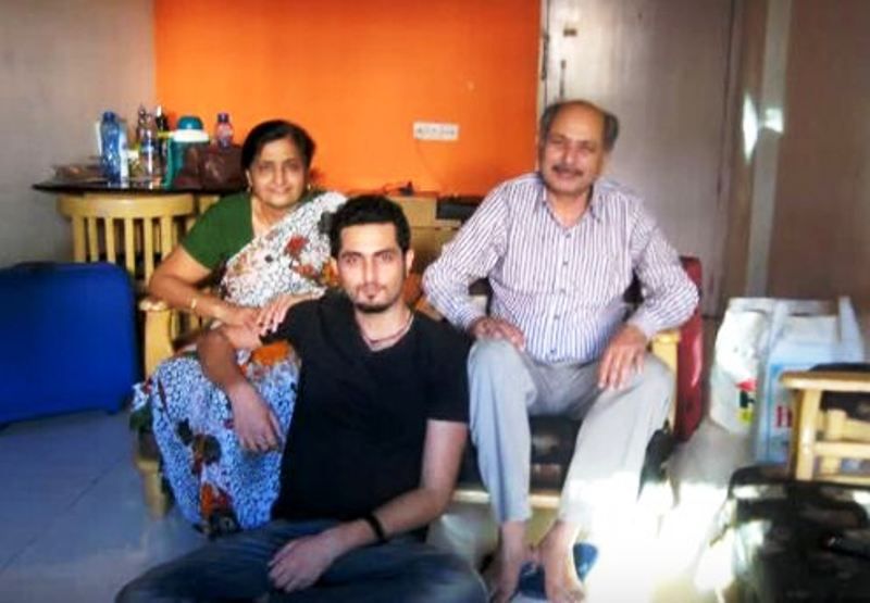 Adil Khan and his parents