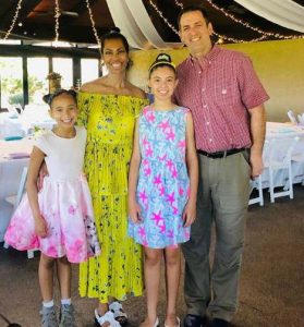 Harris Faulkner with husband Tony and two daughters